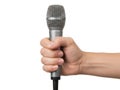 Hand holding microphone isolated on white background Royalty Free Stock Photo