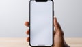 Hand holding mobile phone, displaying blank screen, using wireless technology generated by AI Royalty Free Stock Photo