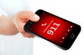 Hand holding mobile phone with emergency number 911 Royalty Free Stock Photo