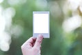 A hand holding mockup of polaroid photo frame Royalty Free Stock Photo