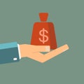 Hand holding money bag. vector Royalty Free Stock Photo