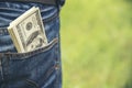 Hand holding money dollar bank note in wallet give financial payment. Man hands showing spread 100 dollar exchange cash payout.