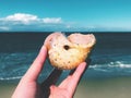 A hand holding a moon shell Royalty Free Stock Photo