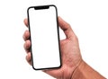 Hand holding, New version of black slim smartphone similar to iphone x Royalty Free Stock Photo