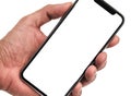 Hand holding, New version of black slim smartphone similar to iphone x Royalty Free Stock Photo