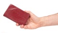 Hand holding the old bible, giving Royalty Free Stock Photo