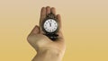 Hand holding old fashioned vintage pocket watch. Royalty Free Stock Photo