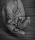 Hand Holding Old Key Giving Away Royalty Free Stock Photo