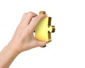 Hand holding one golden puzzle piece Royalty Free Stock Photo