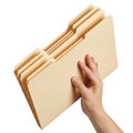 Hand holding open manilla file folders with tabs Royalty Free Stock Photo