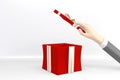 Hand holding an open red gift box on white background.3D rendering Royalty Free Stock Photo