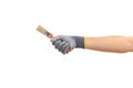 Hand holding a paint brush on white background Royalty Free Stock Photo