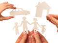 Hand holding a paper home, car, family on white background Royalty Free Stock Photo