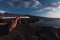 Hand holding a paper plane with the words Deja Volar tus suenos, Spanish for Let Your Dreams Fly Royalty Free Stock Photo