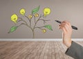 Hand holding pen and Drawing of Money and idea graphics on plant branches on wall Royalty Free Stock Photo