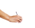 Hand holding pen writing something text isolated on white background. Clipping path. Royalty Free Stock Photo