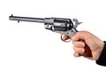 Hand holding percussion revolver