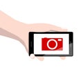 Hand Holding Phone with Camera Icon on Screen Royalty Free Stock Photo