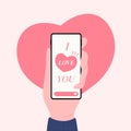 Hand holding phone with i love you messages, Happy Valentines day design concept. Royalty Free Stock Photo