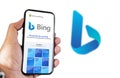 A hand holding a phone with the Microsoft Bing website on the screen Royalty Free Stock Photo