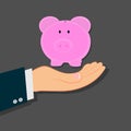 Hand holding piggy bank, financial,vector icon