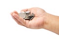 Hand Holding A Pile Of Coins Over White Background Royalty Free Stock Photo