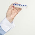 Hand holding pill box. Royalty Free Stock Photo