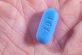 Hand holding Pill used for HIV PreP Royalty Free Stock Photo