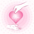 Hand holding pink heart with hope and give or share to other han