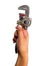 Hand holding pipe wrench Royalty Free Stock Photo