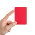 A hand holding a plain red card against a white background Royalty Free Stock Photo