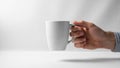 The mug is smooth and cylindrical with a standard curved handle Royalty Free Stock Photo