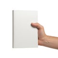 A hand holding a plain white rectangular object against a plain background Royalty Free Stock Photo