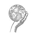 Hand holding planet earth. Engraving vintage vector black illustration Royalty Free Stock Photo