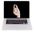 Hand Holding Planet Earth with fingers, on Laptop Monitor isolated on white background Royalty Free Stock Photo