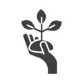 Hand holding plant growing, silhouette icon design Royalty Free Stock Photo