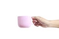 Hand holding plastic cup like a pouring Royalty Free Stock Photo