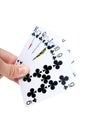 Hand holding Playing Cards isolated