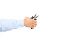 Hand holding pliers Royalty Free Stock Photo