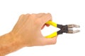 Hand holding pliers on white background Royalty Free Stock Photo
