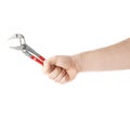 Hand holding a plumber wrench tool, composition isolated over the white background Royalty Free Stock Photo