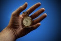 Hand holding pocket watch Royalty Free Stock Photo