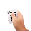Hand holding a poker cards isolated on white background Royalty Free Stock Photo