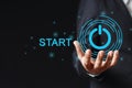 Hand holding press start button. beginning goal new target. click control success business digital Royalty Free Stock Photo