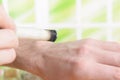 Hand with professional moxa sticks Royalty Free Stock Photo