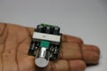 Hand holding pulse width modulation speed controller board module for dc motor