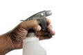 Hand holding Pump sprayer isolated on white background. Royalty Free Stock Photo