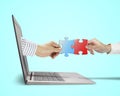 Hand holding puzzle coming out from screen connect with another Royalty Free Stock Photo