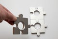 Hand holding puzzle piece Royalty Free Stock Photo
