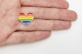 Hand holding rainbow gay pride symbol heart as lgbt rights concept Royalty Free Stock Photo